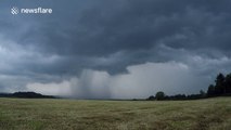 Beautiful thunderstorm passes across fields in Northern Ireland