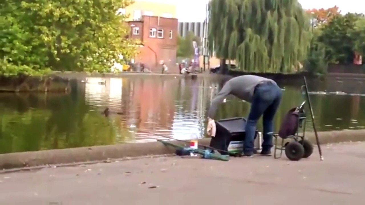 Cruel pranksters push fisherman into pond before fleeing
