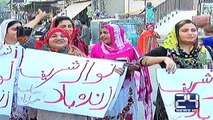 PMLN workers conduct a sit in against PAT and PTI in Multan