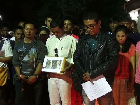 Migrants hold vigil for Hannah and David