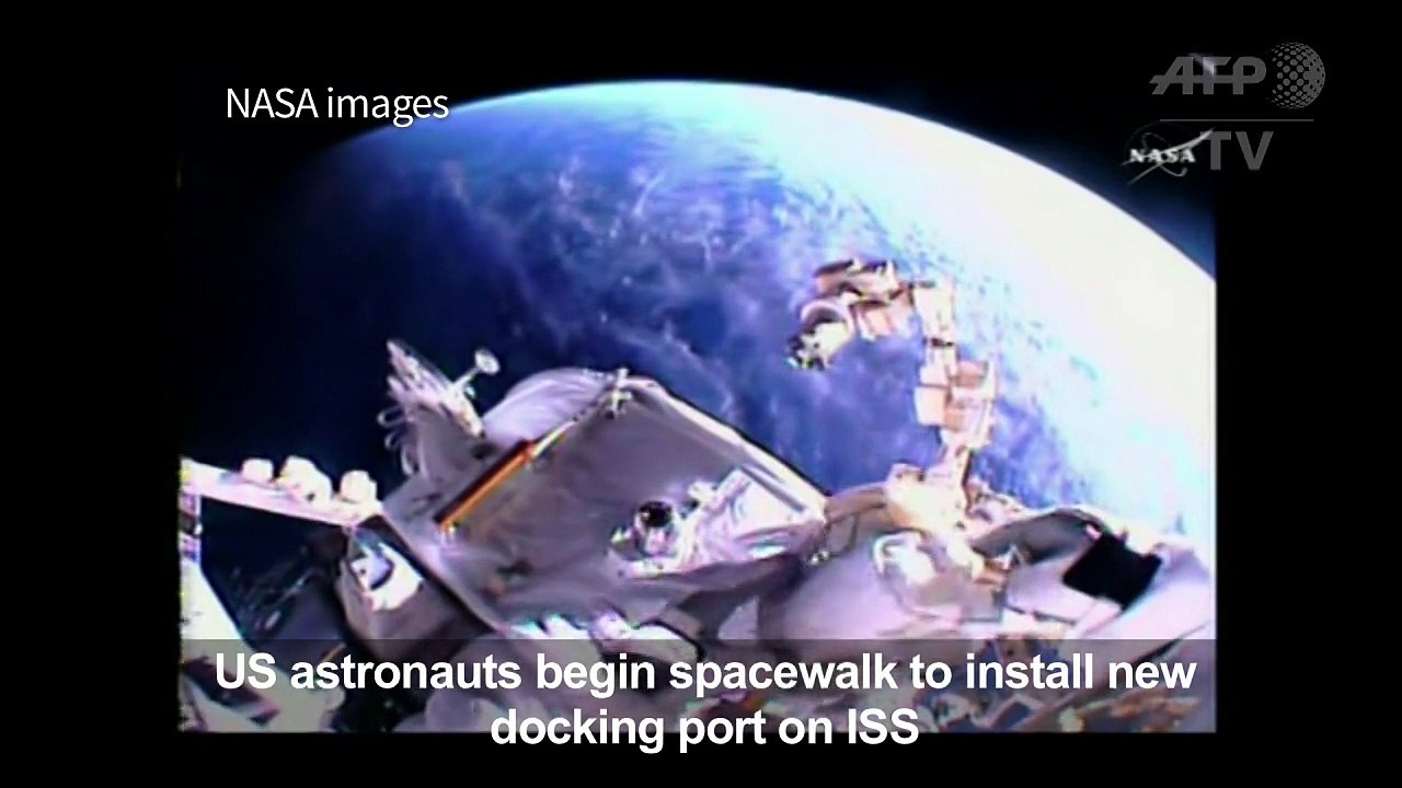 US astronauts begin spacewalk to install new docking port