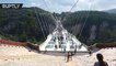 Don't crack it! Worlds longest glass bottom bridge opens in Hunan, China(1)