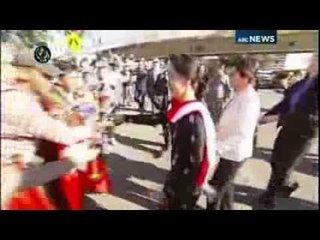 Suu Kyi arrives in Australia