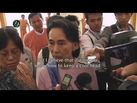 Suu Kyi calls for 'cool heads' in wake of bombings