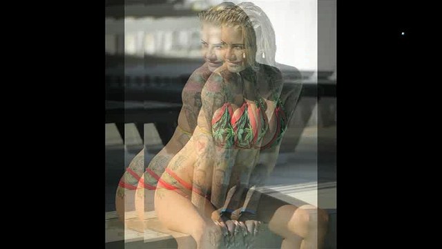 Jemma Lucy flaunts her cleavage in a skimpy bikini