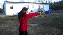 15 year old asian girl. Beasting an M and P 40