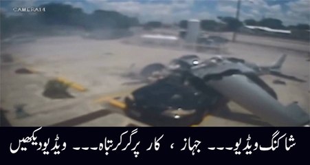 Shocking moment plane crash lands onto a car