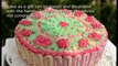 Cake with flowers. A simple sponge cake and soufflé. The decoration of the cake.