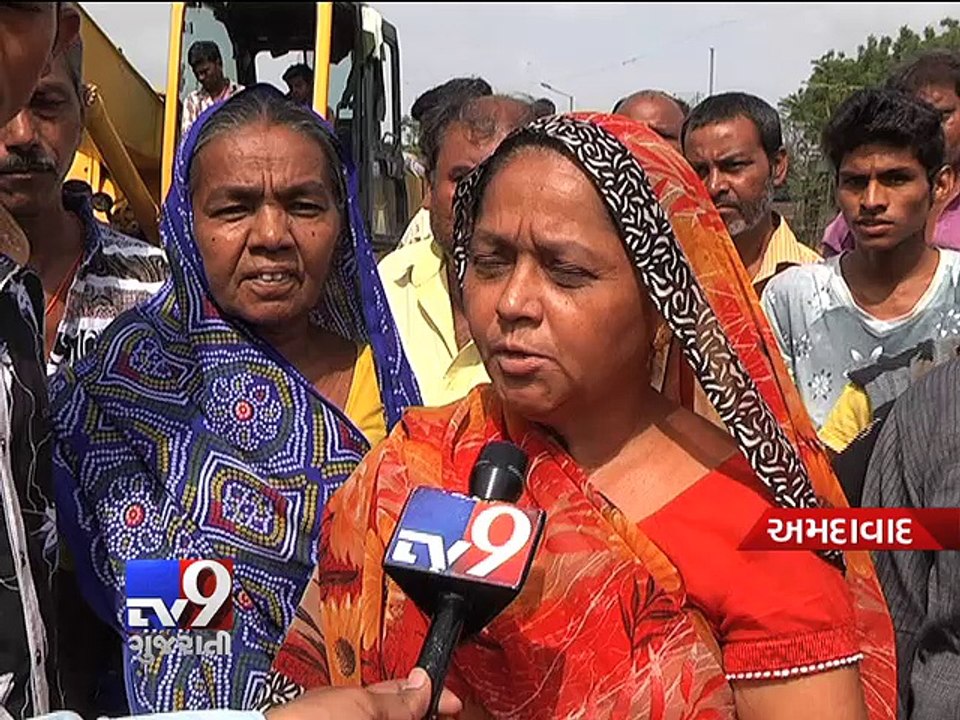 Yawning potholes and pits riddle Ahmedabad roads -  Tv9 Gujarati