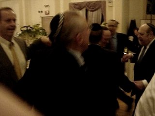 Henry dances with shul dudes