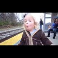 Little Girl Looks at Train for the First Time