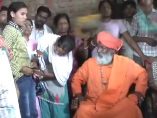 Indian girl forced to remove her pant infront of Sakshi Maharaj publicly