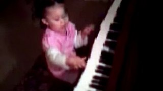 Carly playing the piano at 19 month old!!!