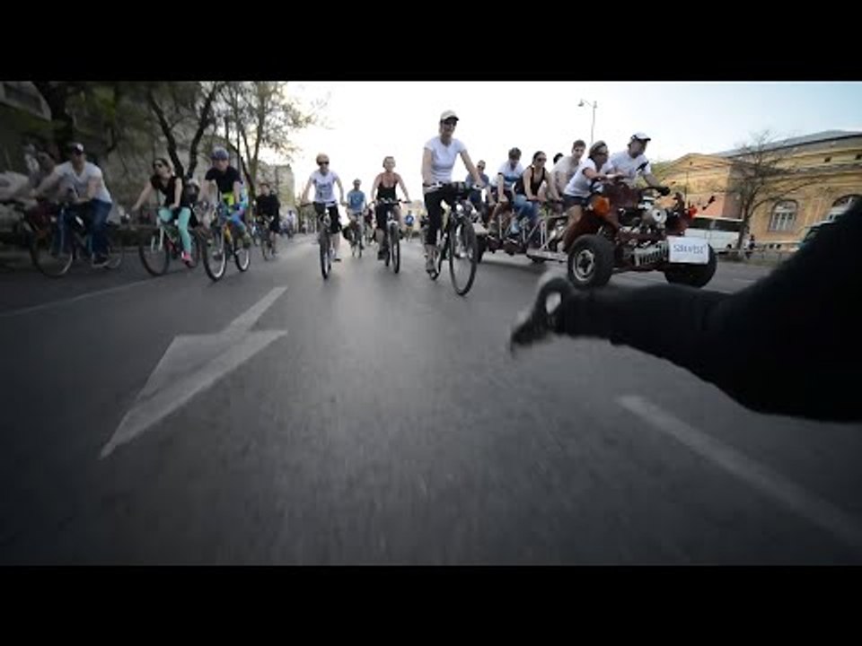 Man Skateboards Through Budapest Among Thousands of Cyclists