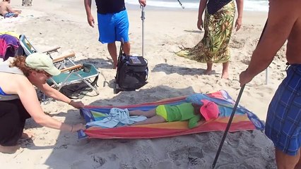 Robyn moves a sleeping Julia (Sun 7/26/15)