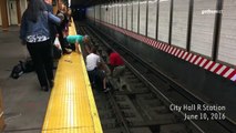 Groupe des bons samaritains de sauver un homme qui est tombé sur les rails du métro dans lower Manhattan !