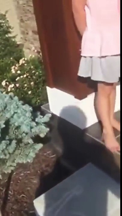 Little Girl Has Drawn a Family of Giraffes on a Stair at the Entrance of a House