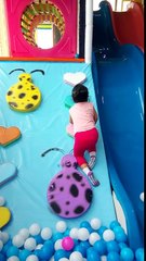 Toddler K wall climbing