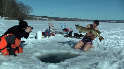Insane Fisherman Goes Ice Fishing, With His Hands!