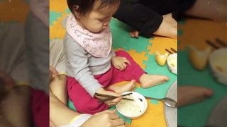 14 months old baby using chopsticks