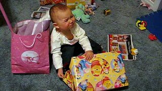 Cate opening a birthday gift - March 28, 2008