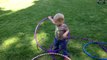 17 months and trying to hula hoop