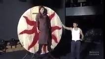 Knife Throwing Artist on Spinning Wheel Target