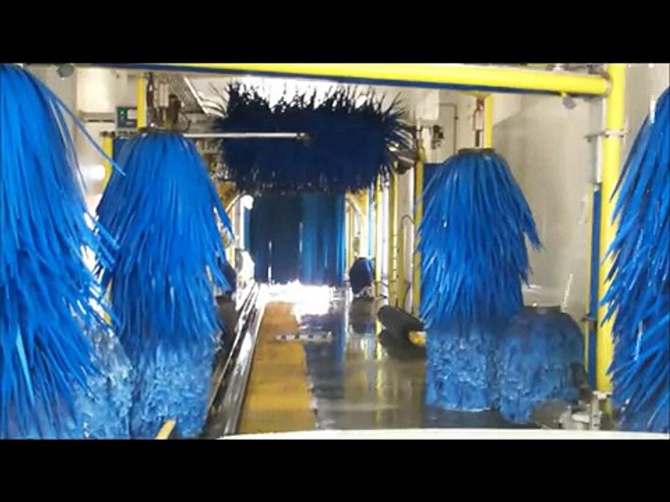 DRIVING THROUGH A CAR WASH