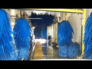 DRIVING THROUGH A CAR WASH