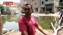 بالفيديو.. قرية عياش بالمحلة تغرق فى الصرف الصحى بسبب انسداد المصرف