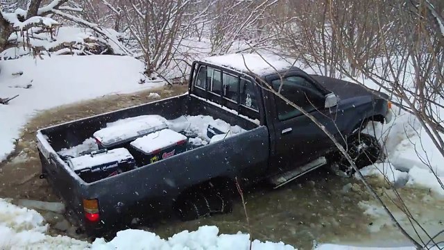 Toyota Hilux Pickup in the snowy swamp