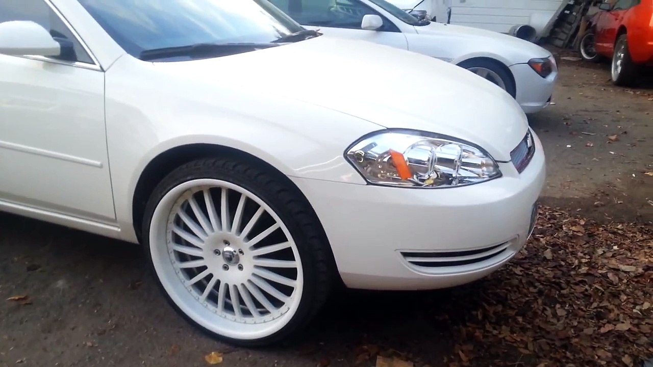 All white impala on 24" asantis