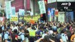 Hong Kong bookseller defies Beijing by leading protest