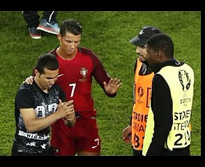 Cristiano Ronaldo takes selfie with fan who ran on field