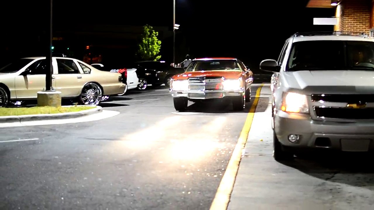 Candy Orange '72 Caprice on 28's.