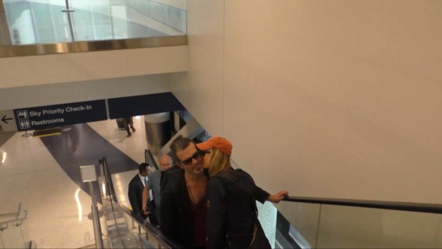 Kim Kardashian And Kanye West In LAX Chaos And Some PDA