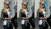 Paris Hilton bents to expose thong