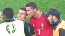 Cristiano Ronaldo Takes Selfie with Fan Who Ran On Field, Protects Him From Security