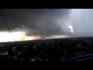 Download Video: Funnel Cloud Sweeps Through Serbian Town Amid Heavy Summer Storm