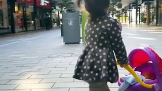 Little Girl Pushing Peppa Pig Stroller / Playground / Having Fun with Baby Doll