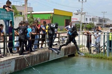 Dalgıçlar, Silahların Gölgesinde Ceset Aradı