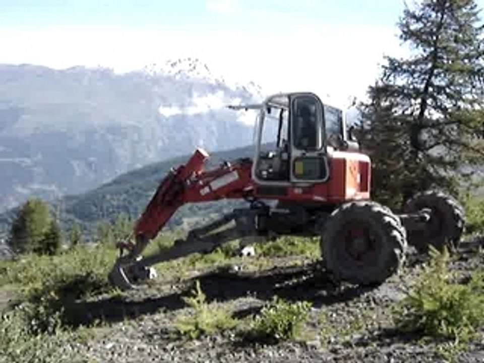 pelle araignée en glisse sur le godet