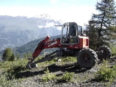 pelle araignée en glisse sur le godet