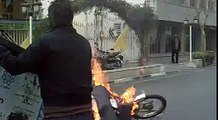 Anti riot motorcycle and dumpster on fire - Iran Tehran 27 Dec  Ashura
