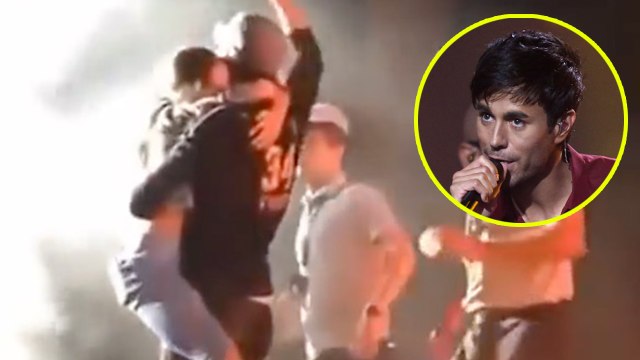 Female Fan Jumped on Enrique Inglesias During His Concert