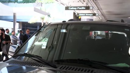 Kris Jenner Laughs As Manager/Boyfriend Corey Gamble Gets In A Photographer's Face