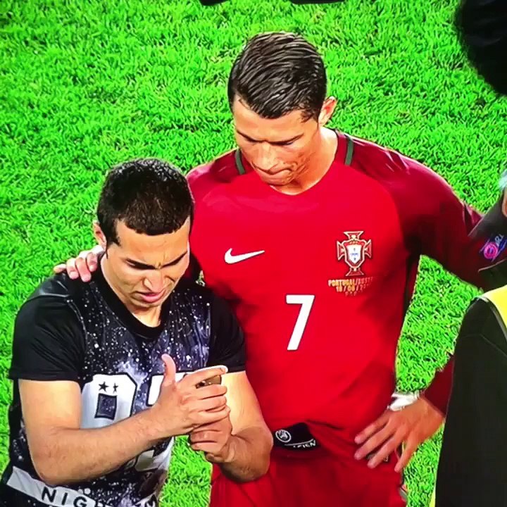 Cristiano Ronaldo allows a Fan to take a Selfie after Portugal vs Austria Match EURO2016