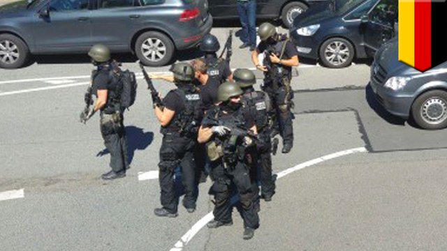 Masked gunman shot dead by police at German movie theater