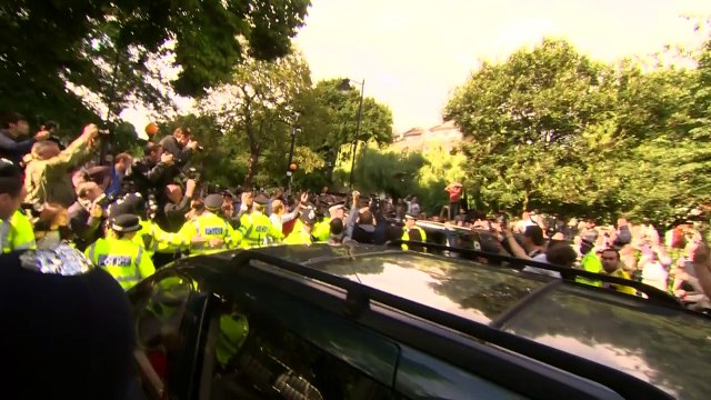 Boris Johnson leaves home to loud booing