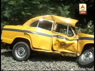 Train-taxi collission at unmanned level crossing